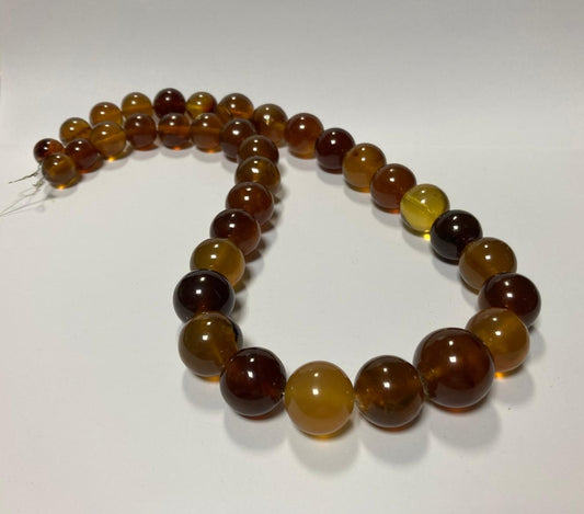 Ambra di sumatra sferica bicolore
