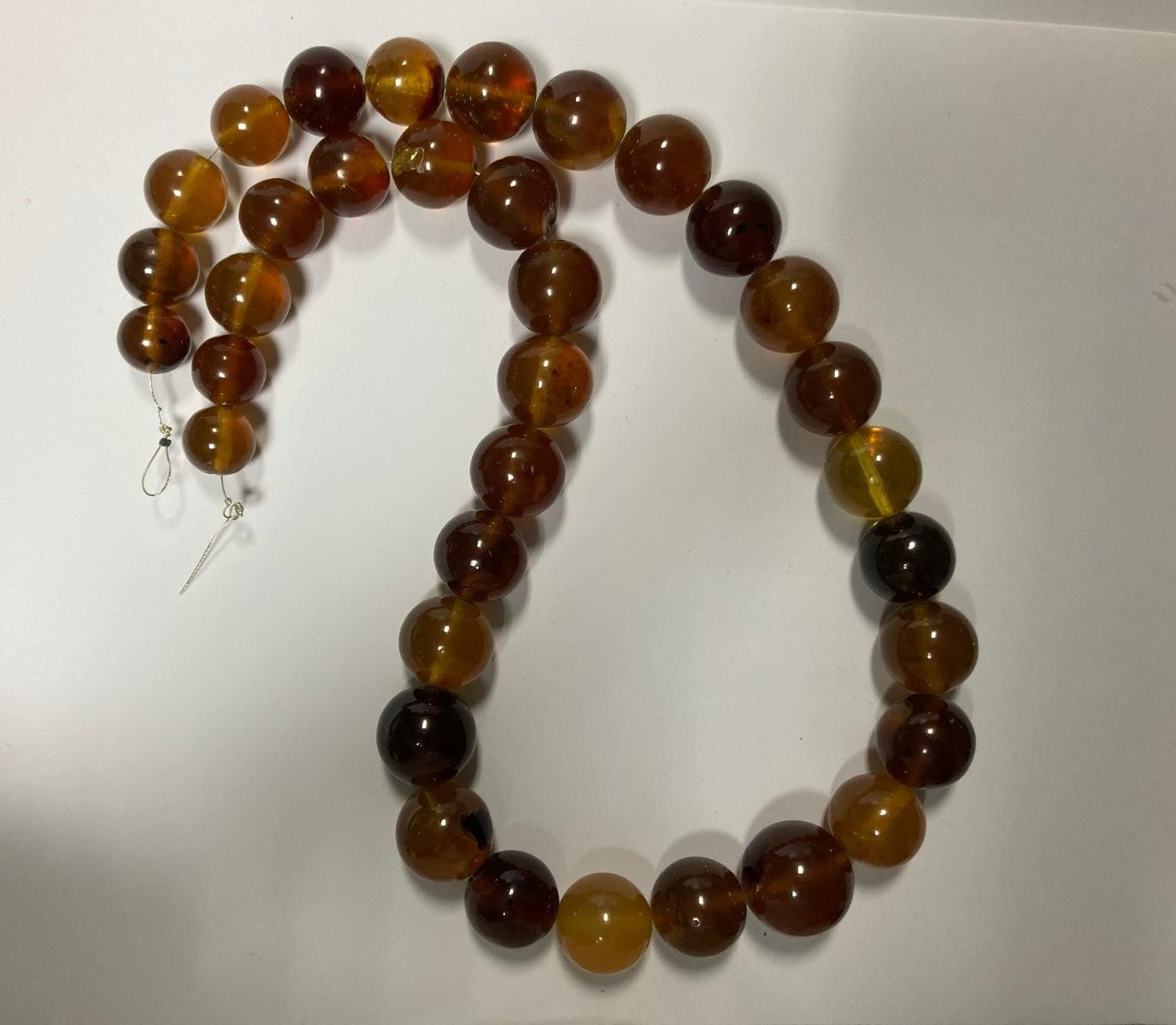 Ambra di sumatra sferica bicolore