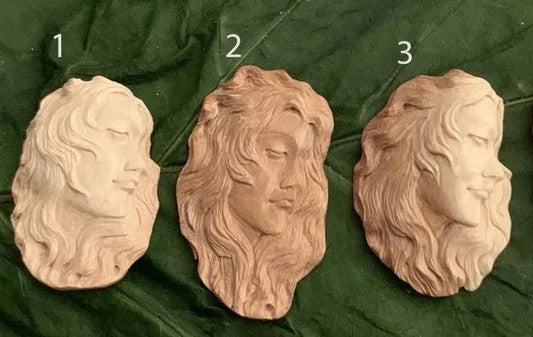Carved mammoth, artistic faces